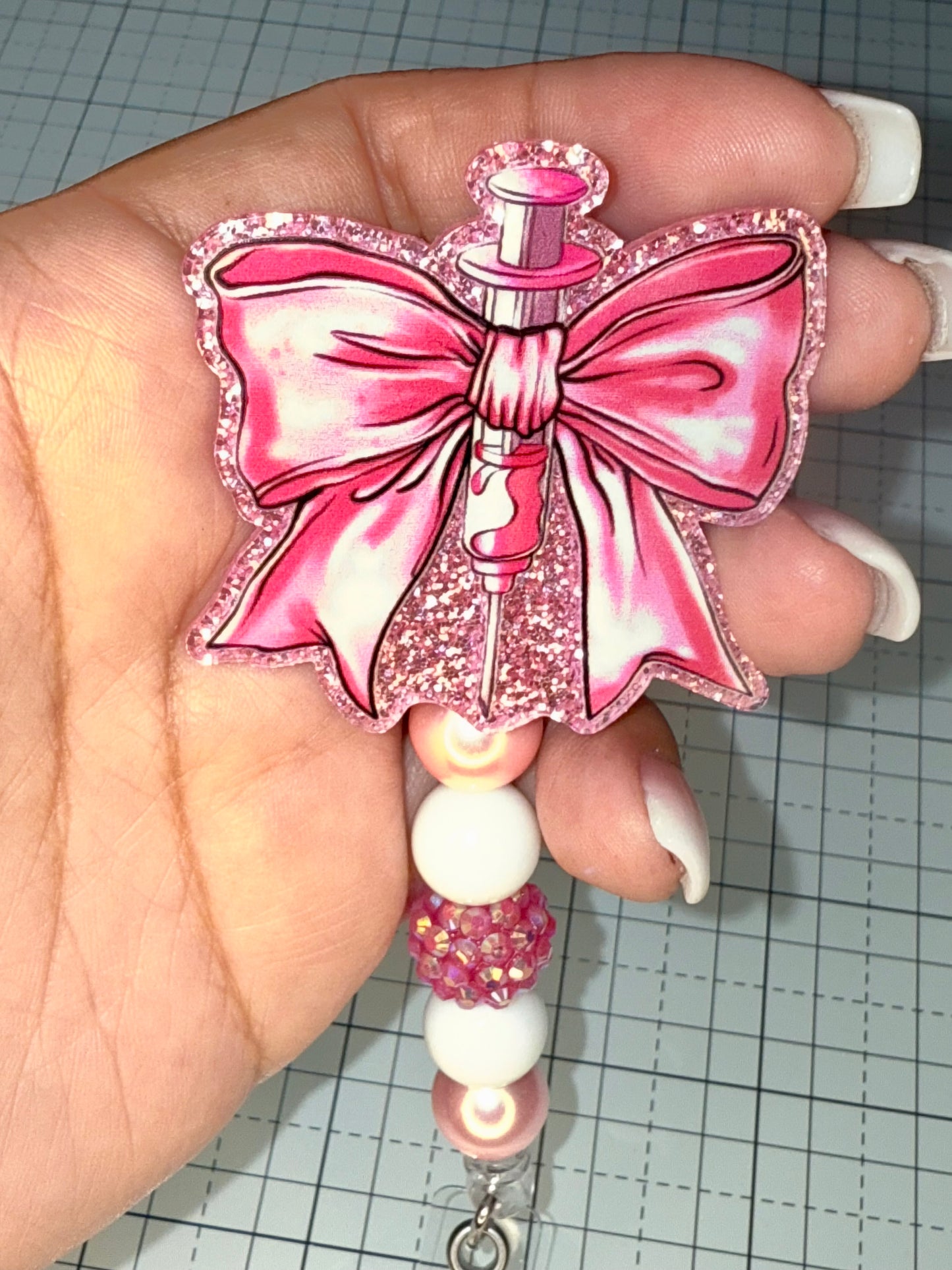 Pink Syringe Bow Nurse Badge Reel