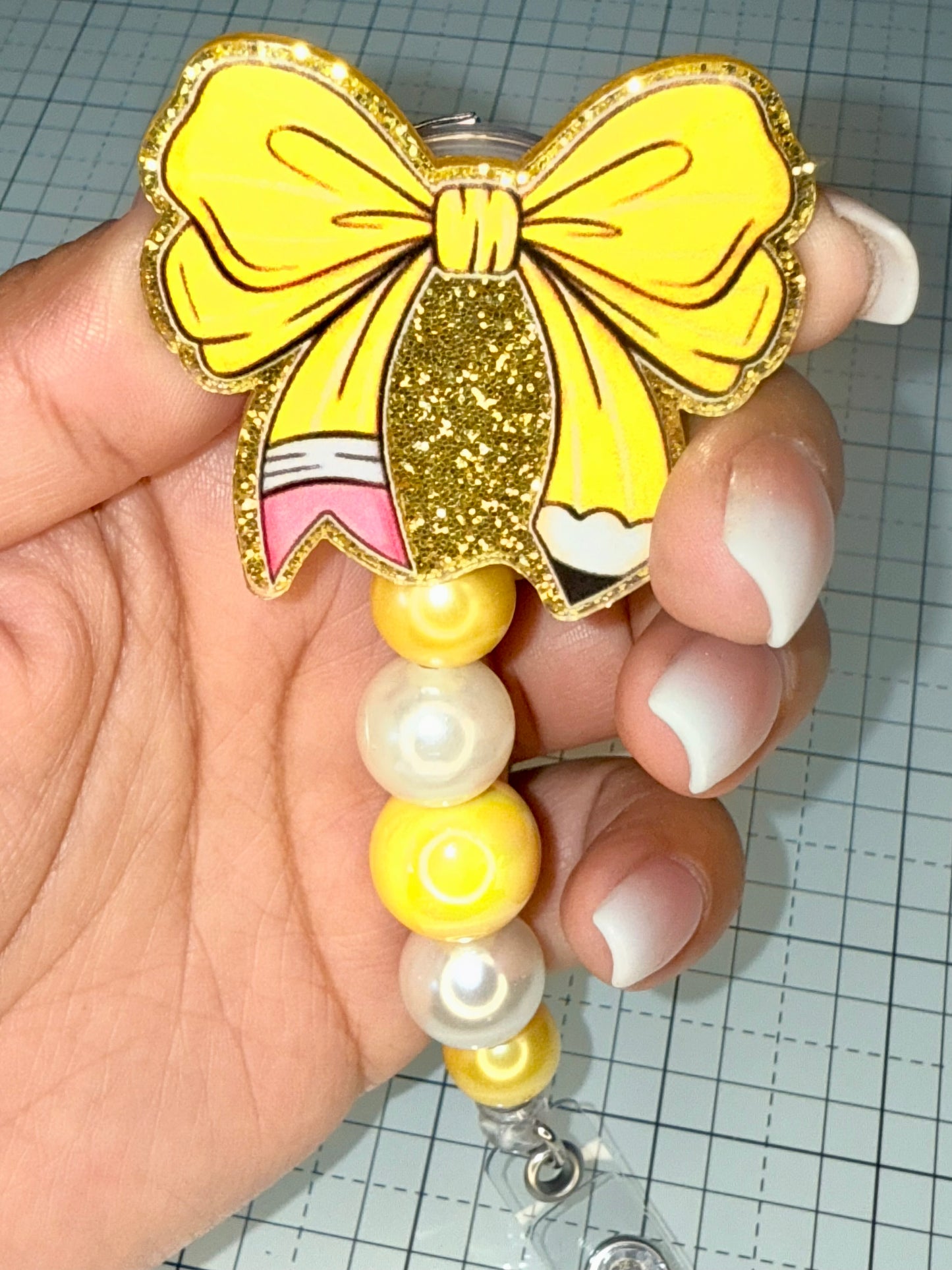 Yellow Bow Pencil Badge Reel
