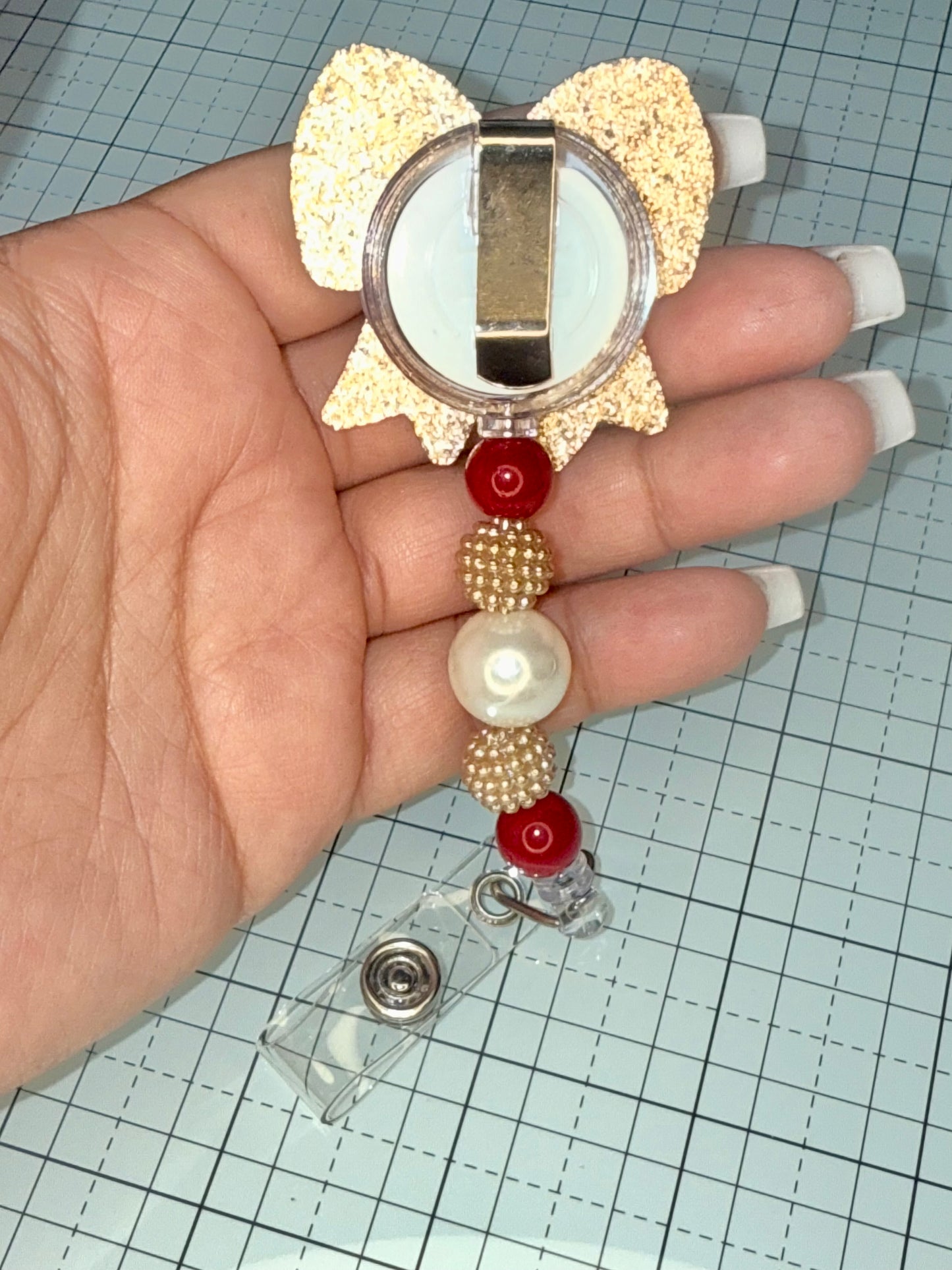Football Bow Badge Reel