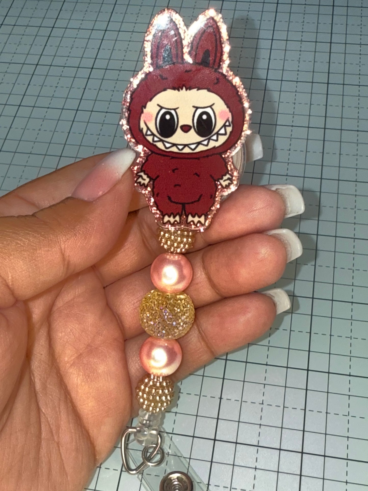 Brown La Bubu Badge Reel
