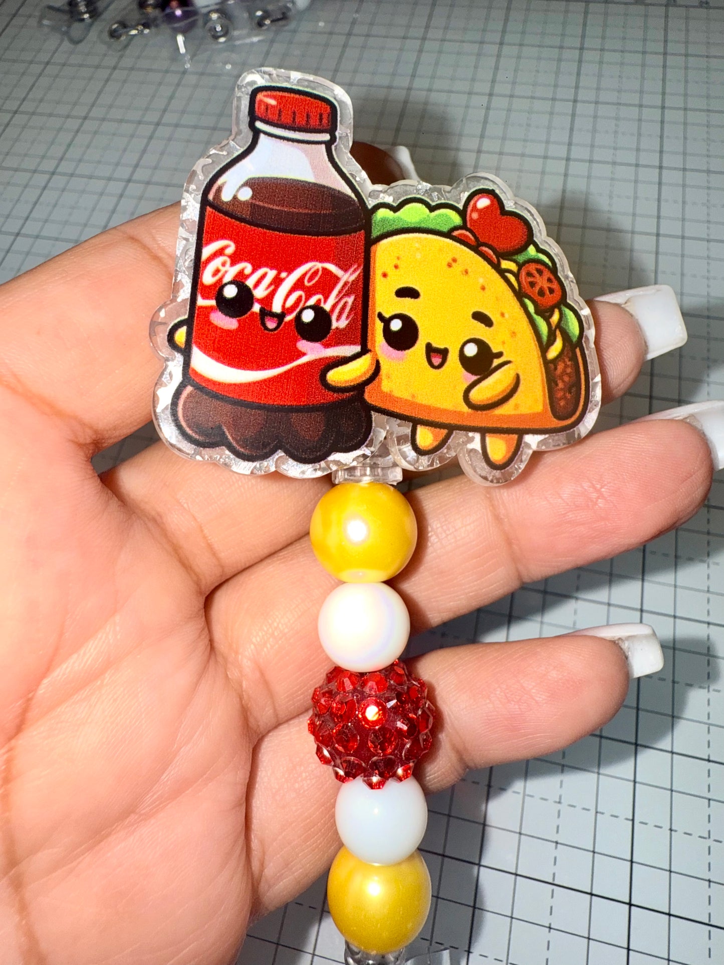 Coke & Tacos Badge Reel