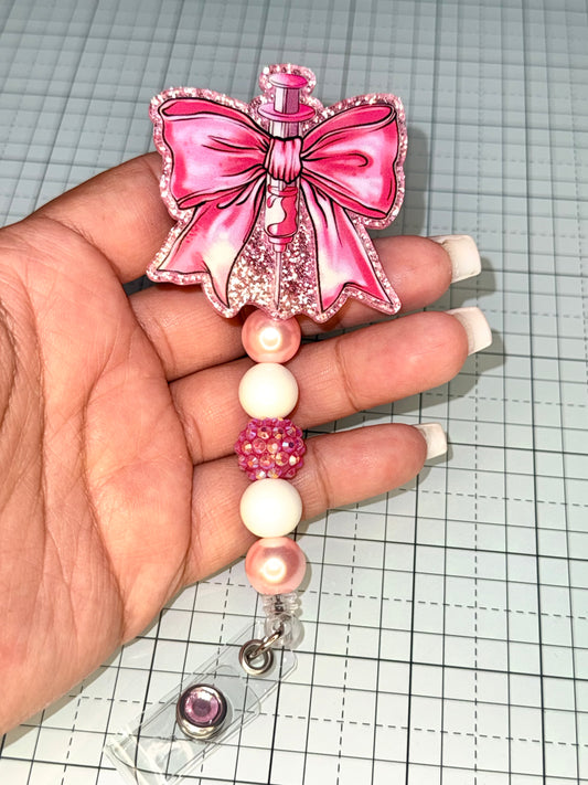 Pink Syringe Bow Nurse Badge Reel