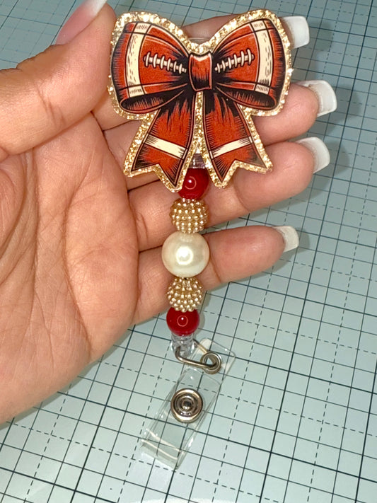 Football Bow Badge Reel